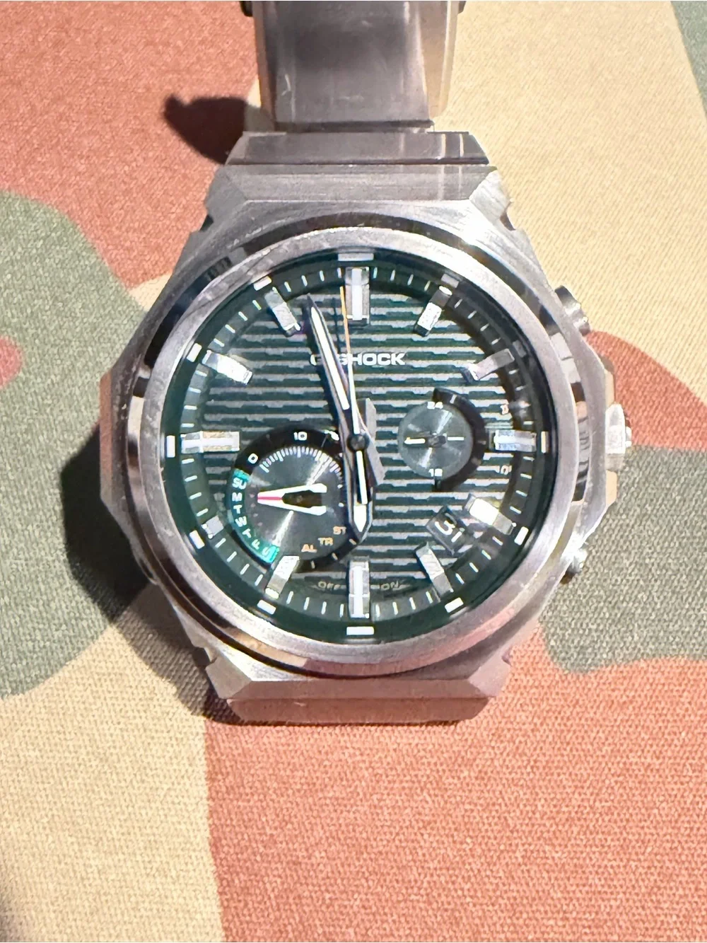 Casio G-Shock Men’s Silver Watch with Green Dial and Steel Bracelet